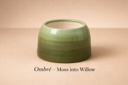 Green ceramic bowl with 'Ombre - Moss into Willow' text on a beige background