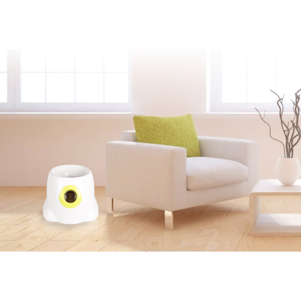 White and yellow device on a wooden floor next to a beige armchair with a green pillow.