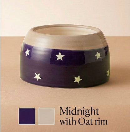 Ceramic bowl with star pattern on a beige background