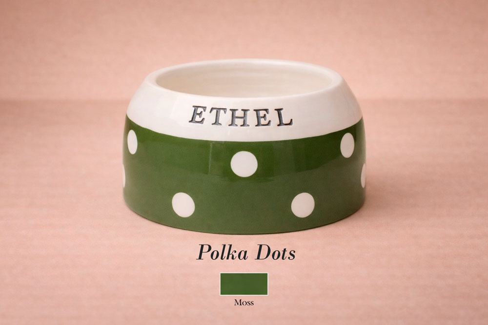 Green polka dot bowl with 'Ethel' on a pink background