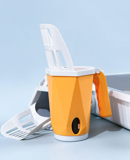 Orange and white Cat Litter Scoop on a light blue background