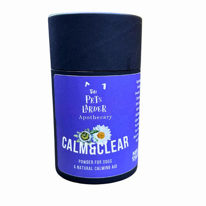Container of 'Calm & Clear' powder for dogs by The Pets Larder Apothecary on a white background