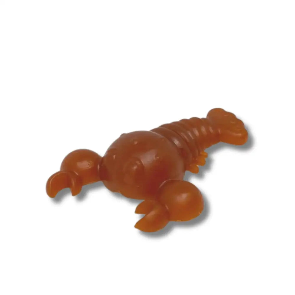 Orange lobster-shaped toy on a white background
