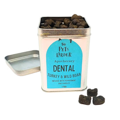 Tin of dental treats for pets with a blue label on a white background