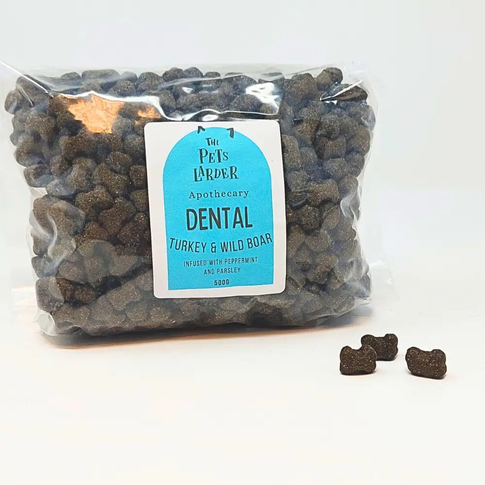 Bag of dental treats for pets with a label on a white background