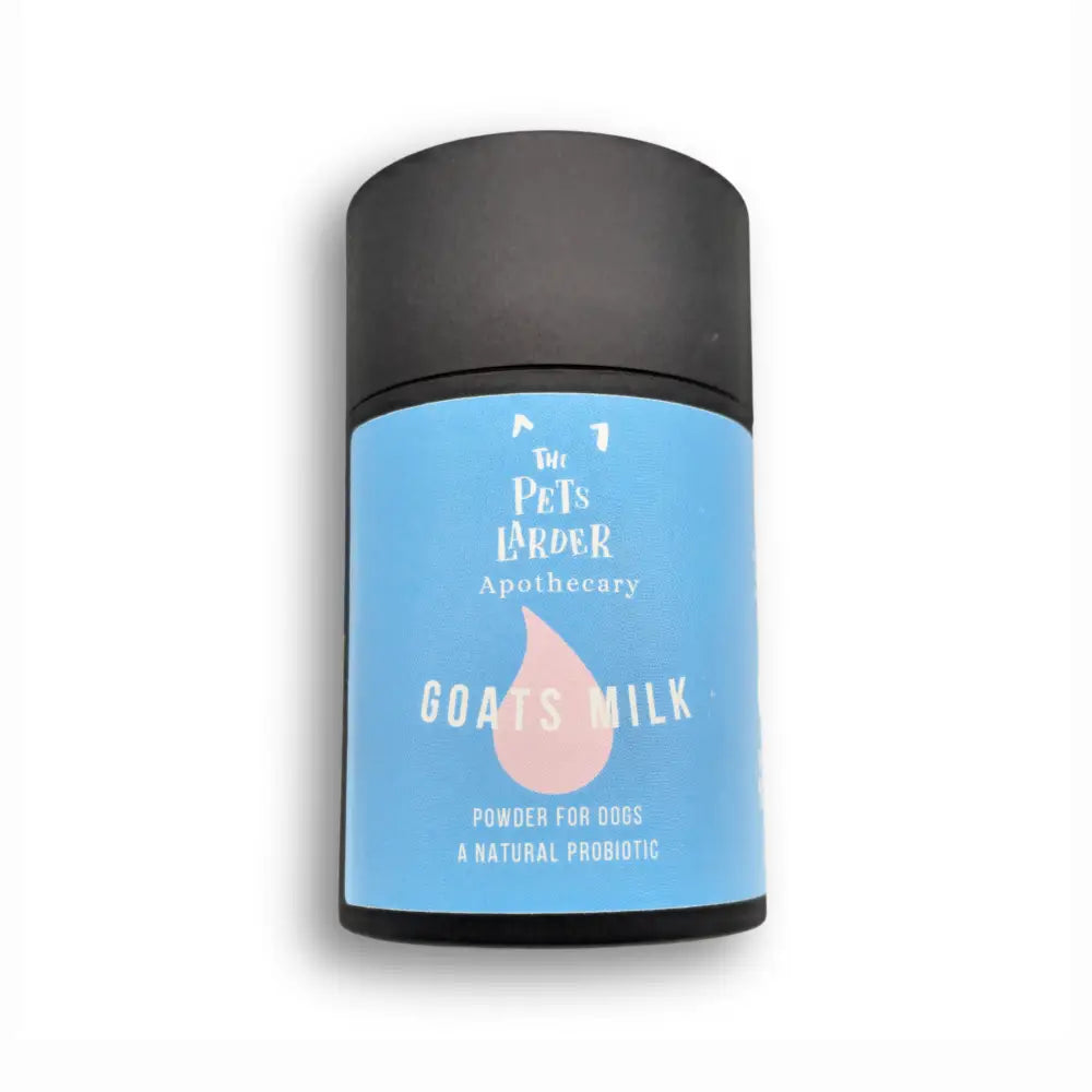 Container of goat's milk powder for dogs with a blue label on a white background