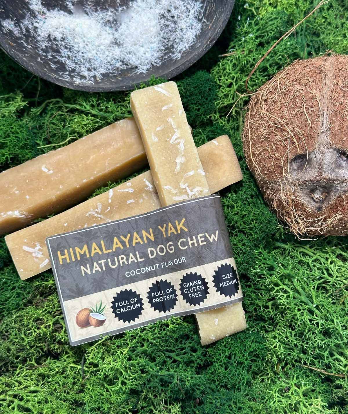 Himalayan Yak Natural Dog Chew packaging with coconut on a green background
