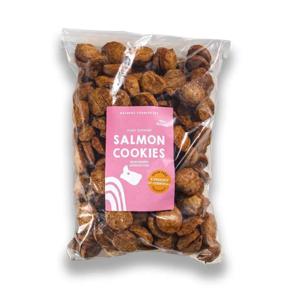 Bag of salmon cookies with a pink label on a white background