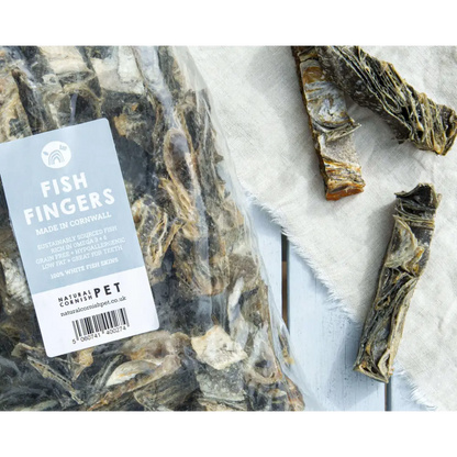 Dried fish fingers with a label on a white background